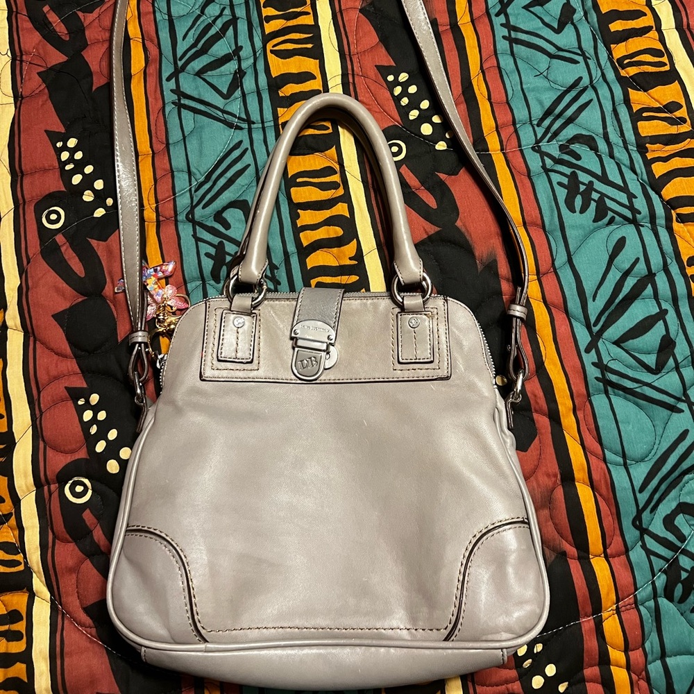 Nice Dana Bachman leather purse. Used but in really good condition.